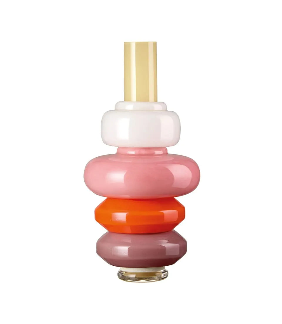 Vaso componibile in vetro multicolore assemblato su fondo bianco