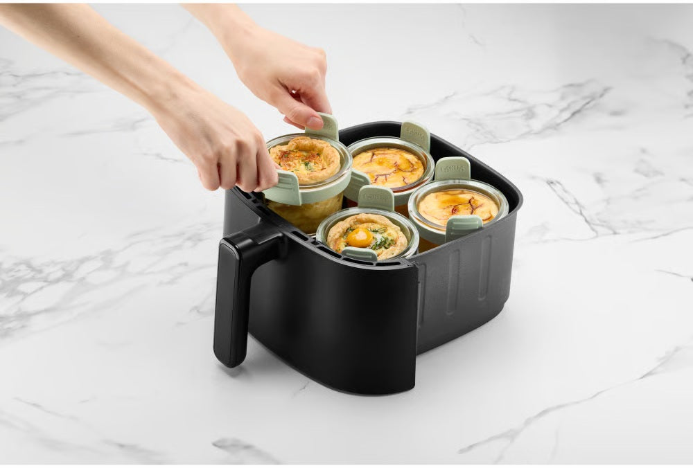 Lekuè set 4 ciotoline in vetro con manici in silicone verde su sfondo bianco – Tuttocasa Domodossola