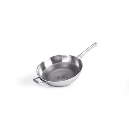 Berndes Tricion Wok 32 cm dettaglio griglia protettiva 3D e coperchio vetro - Tuttocasa Domodossola