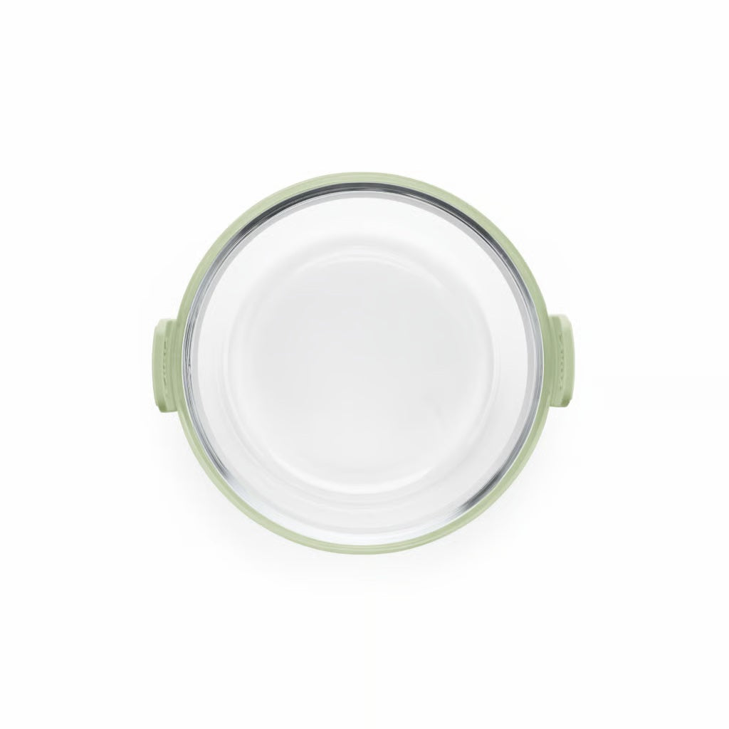 Lekuè Air Fryer Round Glass Dish vista dall'alto con bordo in silicone verde – Tuttocasa Domodossola