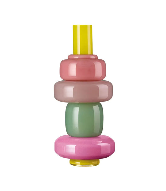 Vaso componibile in vetro assemblato con moduli impilati rosa, verde e giallo